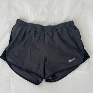 Grey and black Nike shorts